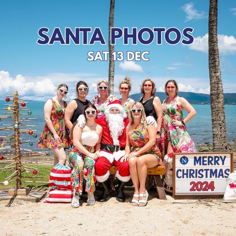 Ladies with Santa in front of the beach